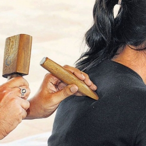 ابزار ماساژ ضربه‌ای